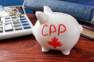 Piggy bank with word CPP. Canada Pension Plan concept. clipart