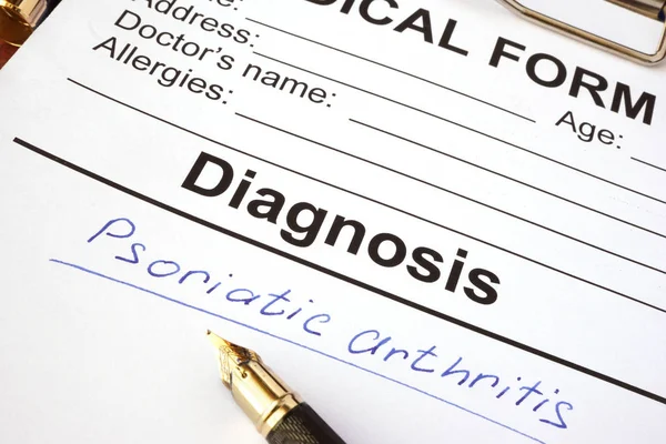 Medical form with diagnosis psoriatic arthritis on a table. — Stock Photo, Image