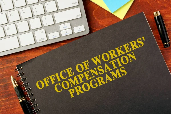 Book with title Office of Workers' Compensation Programs (OWCP).