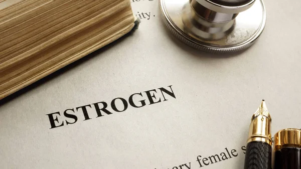 Page with title estrogen and book. — Stock Photo, Image