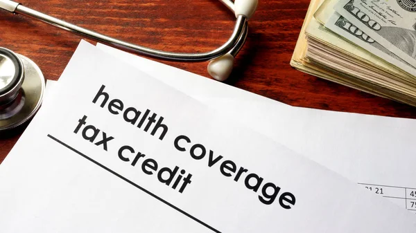 Başlık sağlık kapsama vergi kredisi ile belge. — Stok fotoğraf