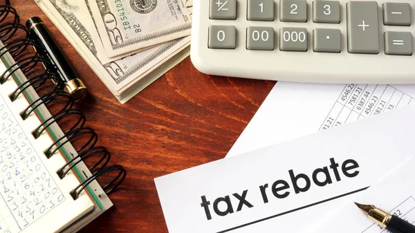 Document with title tax rebate on a table. — Stock Photo, Image