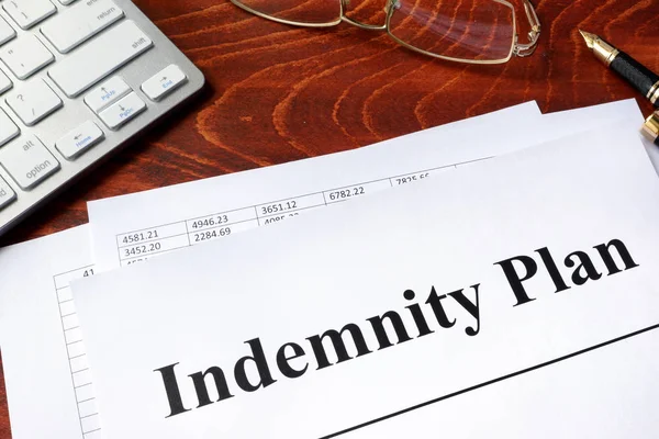 Document with title Indemnity Plan on a table. — Stock Photo, Image