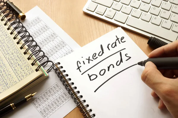 Stały kurs obligacji napisane w notatce. — Zdjęcie stockowe
