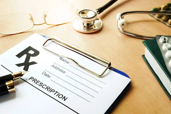 Doctors table with medical prescription form. Healthcare concept. — Stock Photo, Image