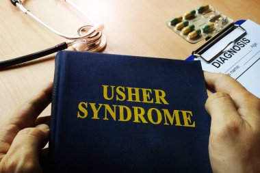 Kitap Usher Sendromu holding eller.