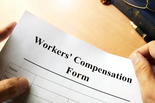 Workers compensation form on a table. — Stock Photo, Image