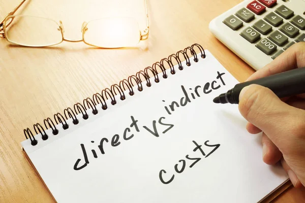 Direct vs indirect costs written by hand in a note. — Stock Photo, Image