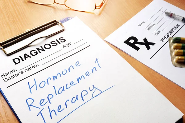 Clipboard with medical form and sign Hormone Replacement Therapy. — Stock Photo, Image