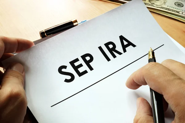 SEP IRA (Pensión de Empleado Simplificada) escrito en un documento . —  Fotos de Stock