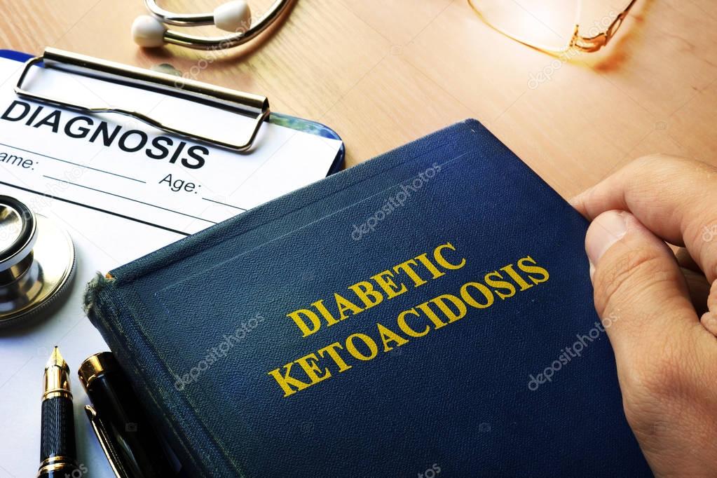 Diabetic ketoacidosis concept. Doctor holding book about disorder.