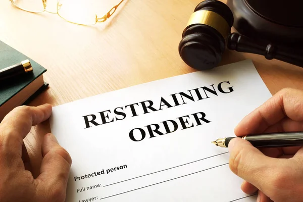 Document with the name restraining order. — Stock Photo, Image