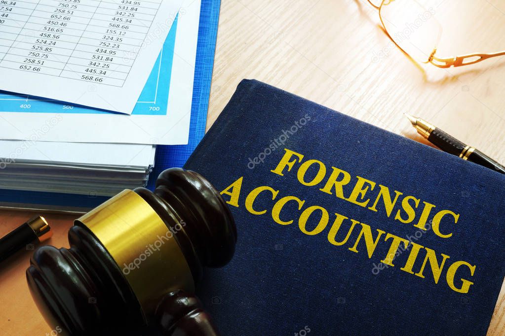 Book with title forensic accounting on a table.