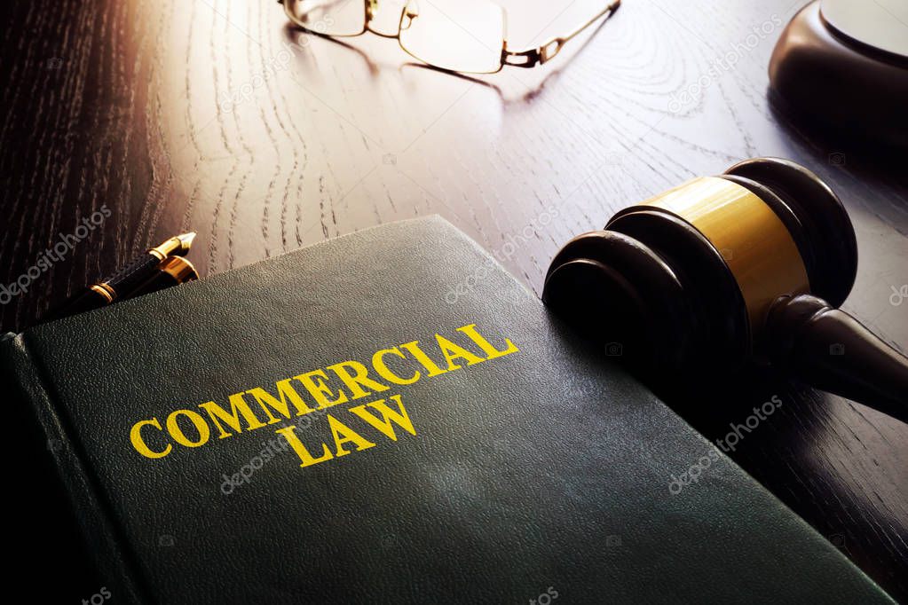 Commercial law and gavel on a table.