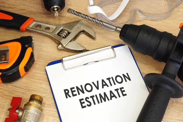 Clipboard with words Renovation estimate and work tools. — Stock Photo, Image