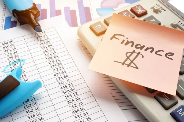 Stick with word finance and business documents. — Stock Photo, Image