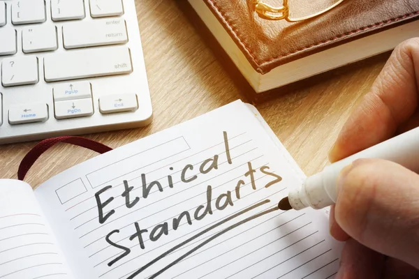 Etiska normer skriven i not. — Stockfoto