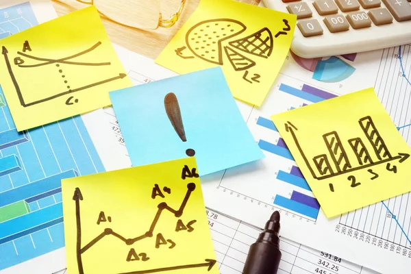Exclamation mark and financial charts in the office. Success solution of business problem. — Stock Photo, Image