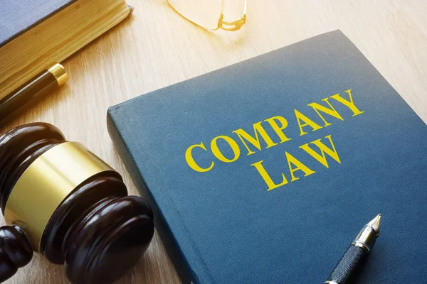 Company law and gavel on a court desk. — Stock Photo, Image