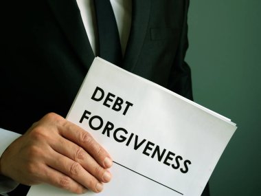 Debt forgiveness agreement that the businessman holds. clipart