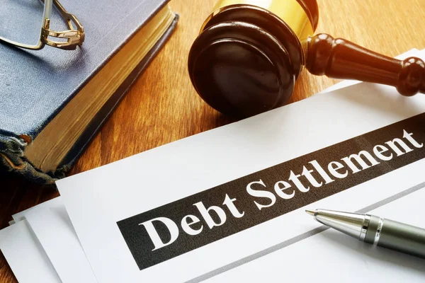 Debt Settlement documents and gavel in the court. — Stock Photo, Image