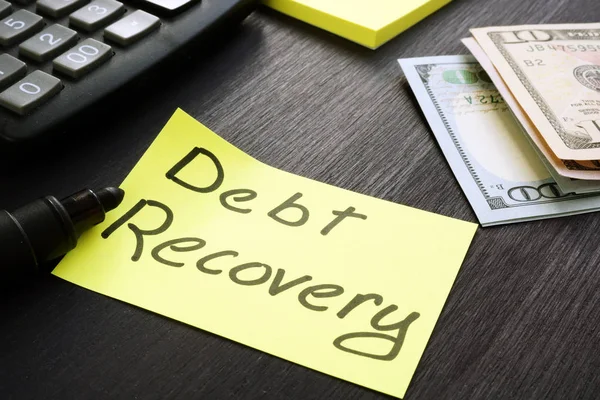 Signo de recuperación de la deuda con efectivo y calculadora . —  Fotos de Stock