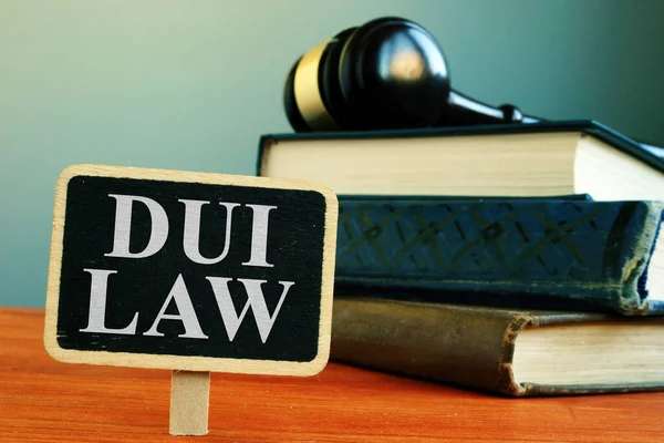 DUI law driving under the influence sign and books. — 스톡 사진