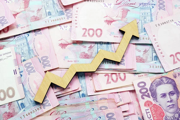 上昇矢印とウクライナの罰金 経済成長と貨幣交換 — ストック写真