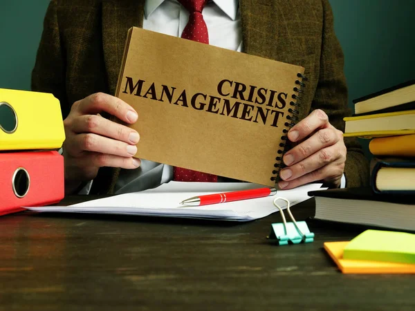 Businessman Holds Crisis Management Plan — Stock Photo, Image