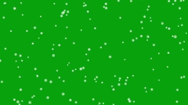 Vallende Sneeuwdeeltjes Met Groene Achtergrond — Stockvideo