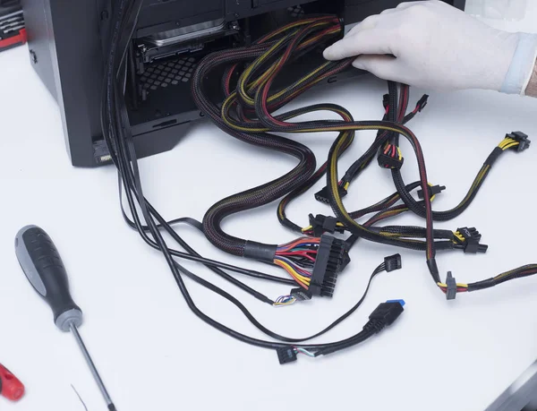 power supply of a computer being assembled in a new computer