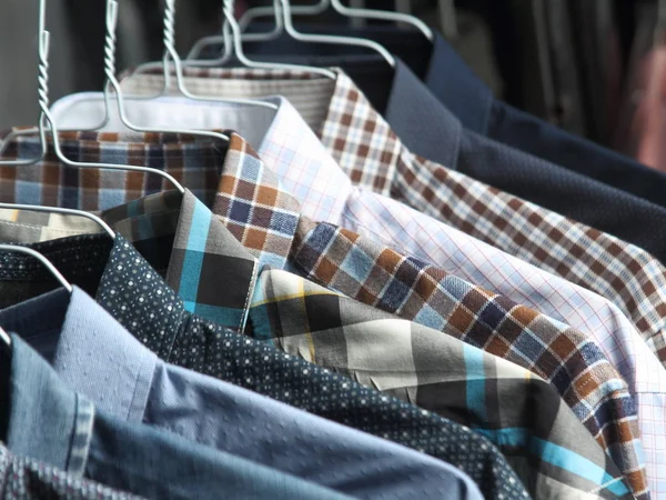 Shirts at the dry cleaners freshly ironed — Stock Photo, Image