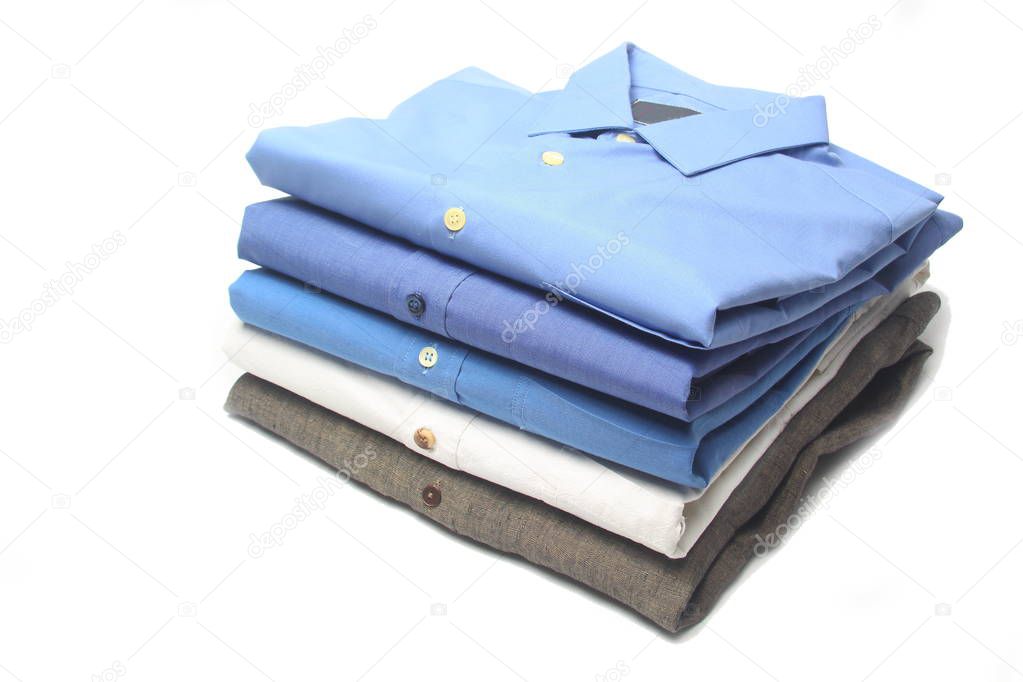 ironed shirts on dry cleaning hanger