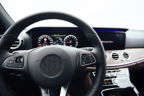 Control buttons on steering wheel. Car interior. — Stock Photo, Image