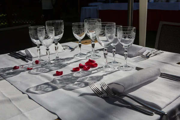 Close up detail of elegant served table outdoors. Stock Picture