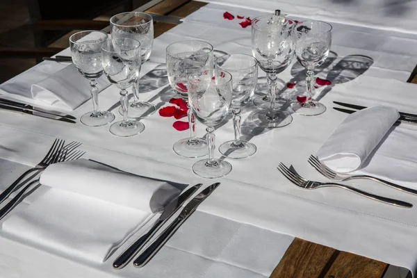 Close up detail of elegant served table outdoors. Royalty Free Stock Photos