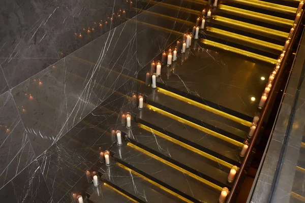 The Burning Candles on stairs. Top view — Stock Photo, Image