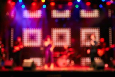 Bulanık arka plan: seyirci, müzik showbiz konsepti ile konser Bokeh aydınlatma.