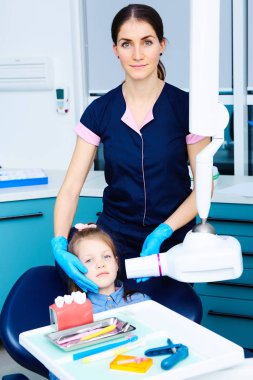 The little patient at the dentists office