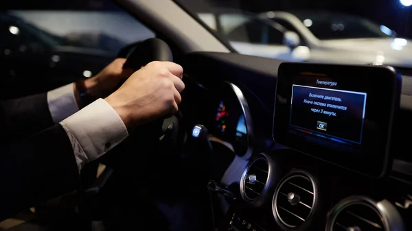 Close up hands on steering wheel. Shallow dof — Stock Photo, Image