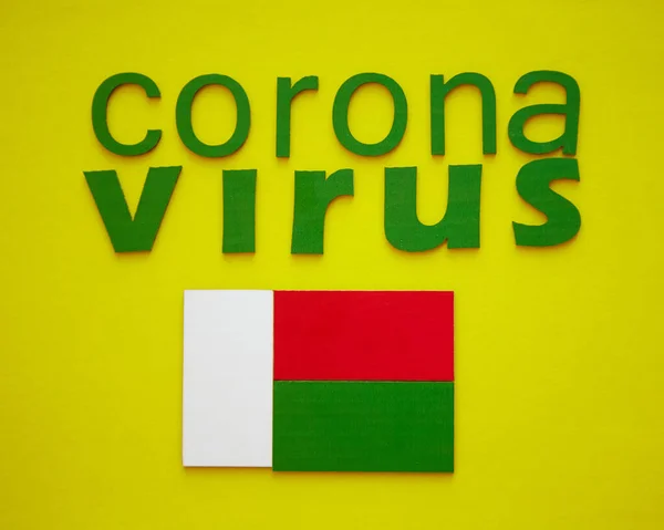 Flag Madagascar Word Coronavirus Made Green Cardboard Letters Isolated Yellow — Stock Photo, Image