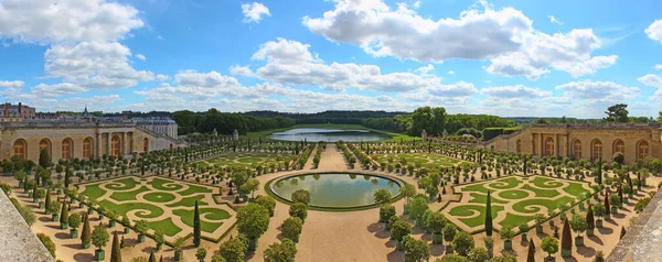 Versailles Palace exterior near Paris, France. This view shows the Orangerie with citrus fruit trees. — Stock Photo, Image