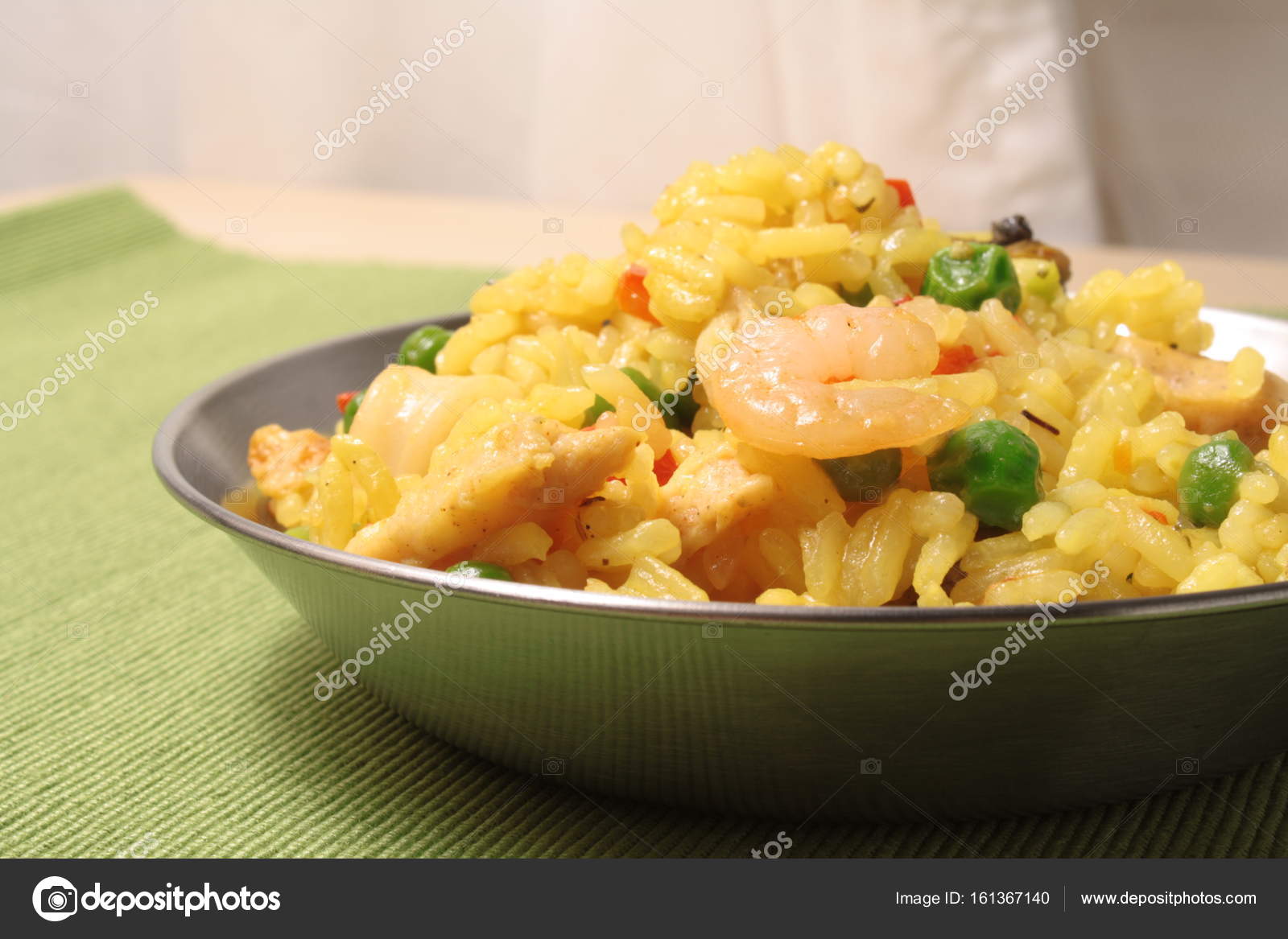 Paella in a small pan — Stock Photo © SergeyLapin 161367140