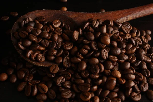 Coffee beans, cinnamon, spoon — Stock Photo, Image