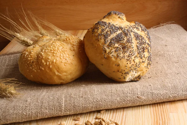 Bun with sesame seeds and poppy seeds, spikelets