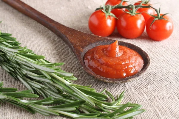 Tomato sauce ketchup tomatoes rosemary — Stock Photo, Image