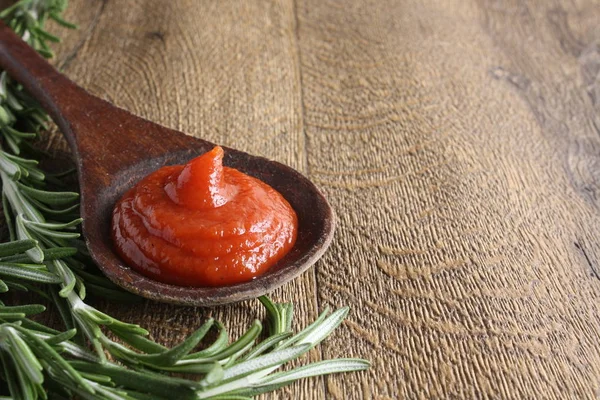 Tomato sauce ketchup tomatoes rosemary — Stock Photo, Image