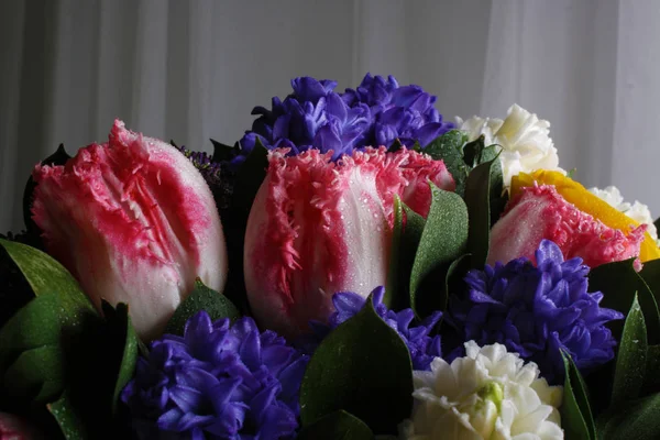 Bouquet of hyacinth rannunculus tulip background — Stock Photo, Image