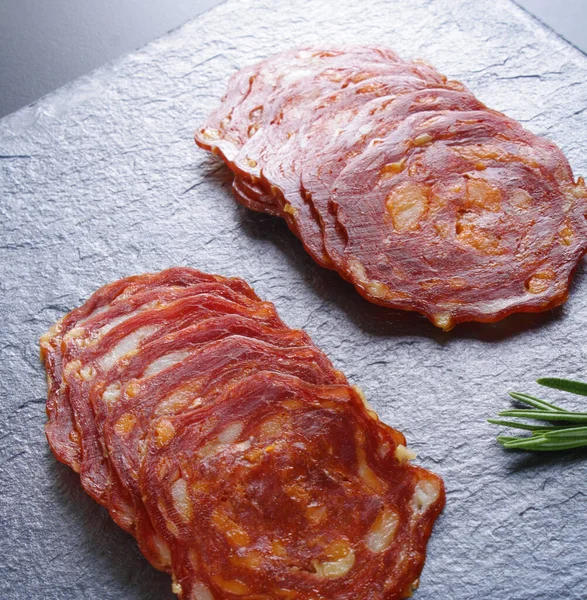 Spicy Spanish Pork Sausage Slicing Dark Stone Background — Stock Photo, Image