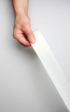 El ve gri arka plan üzerinde bant